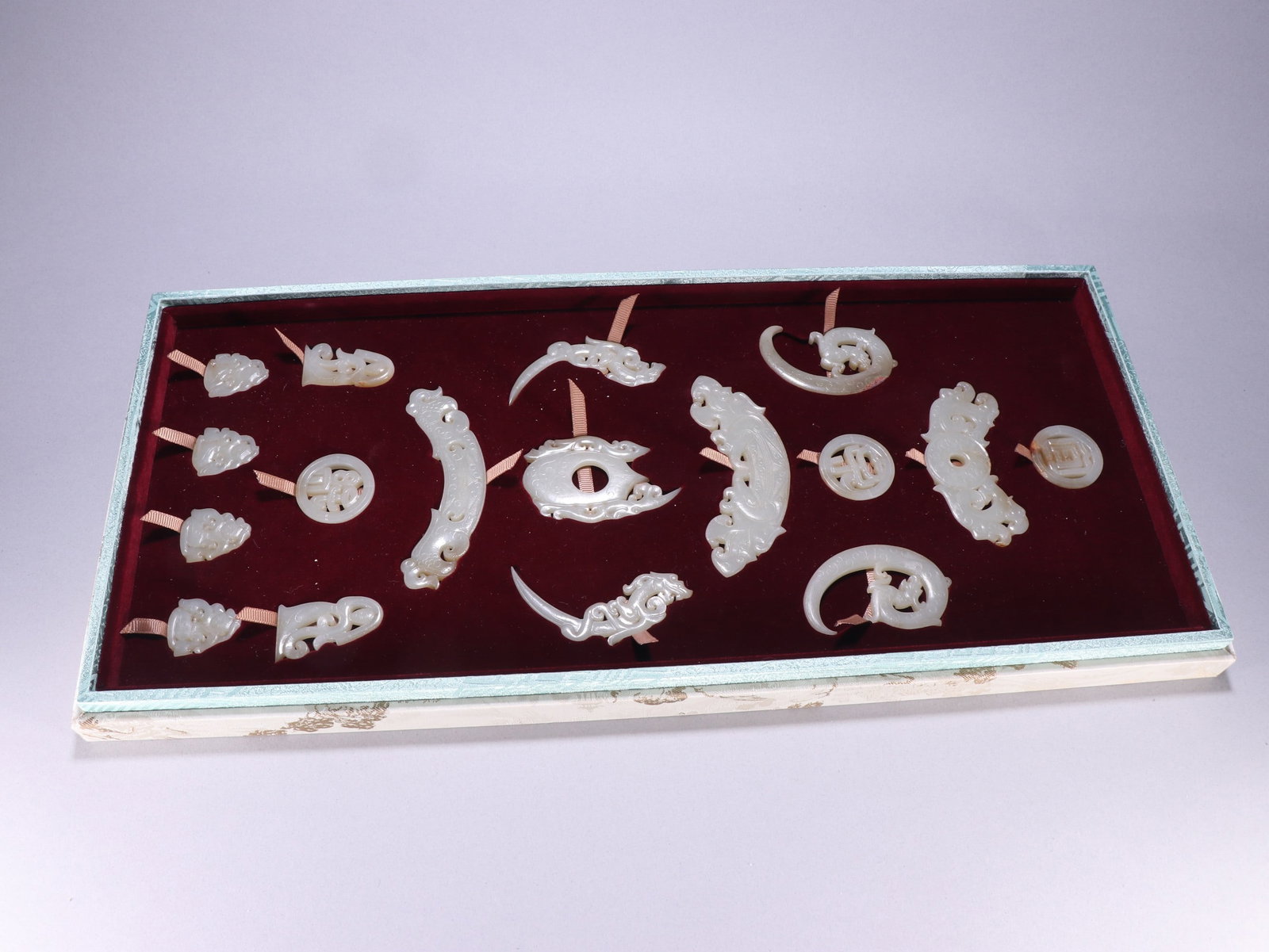 Han Dynasty Hetian Jade Pendant Set: Han Dynasty Hetian Jade Group Pendant Set: Heart-shaped pendant size 7.3×4.7cm, weight 26.2g.