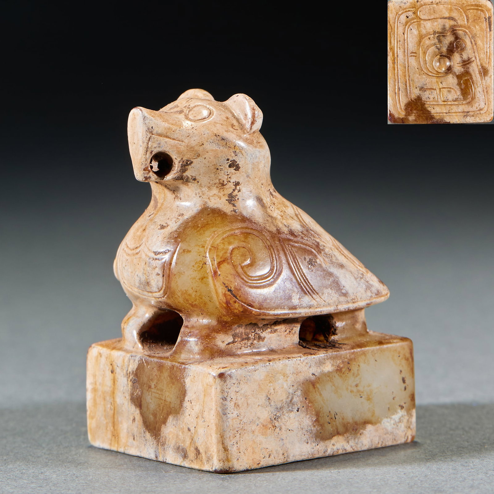 Shang and Zhou Owl Button Seal: Shang and Zhou Owl Button Seal: Made of Hetian jade with natural mottling, seal knob carved into owl shape with mysterious decorative patterns; Height 5.3cm, length 3.8cm, width 3.3cm, weight 113g;