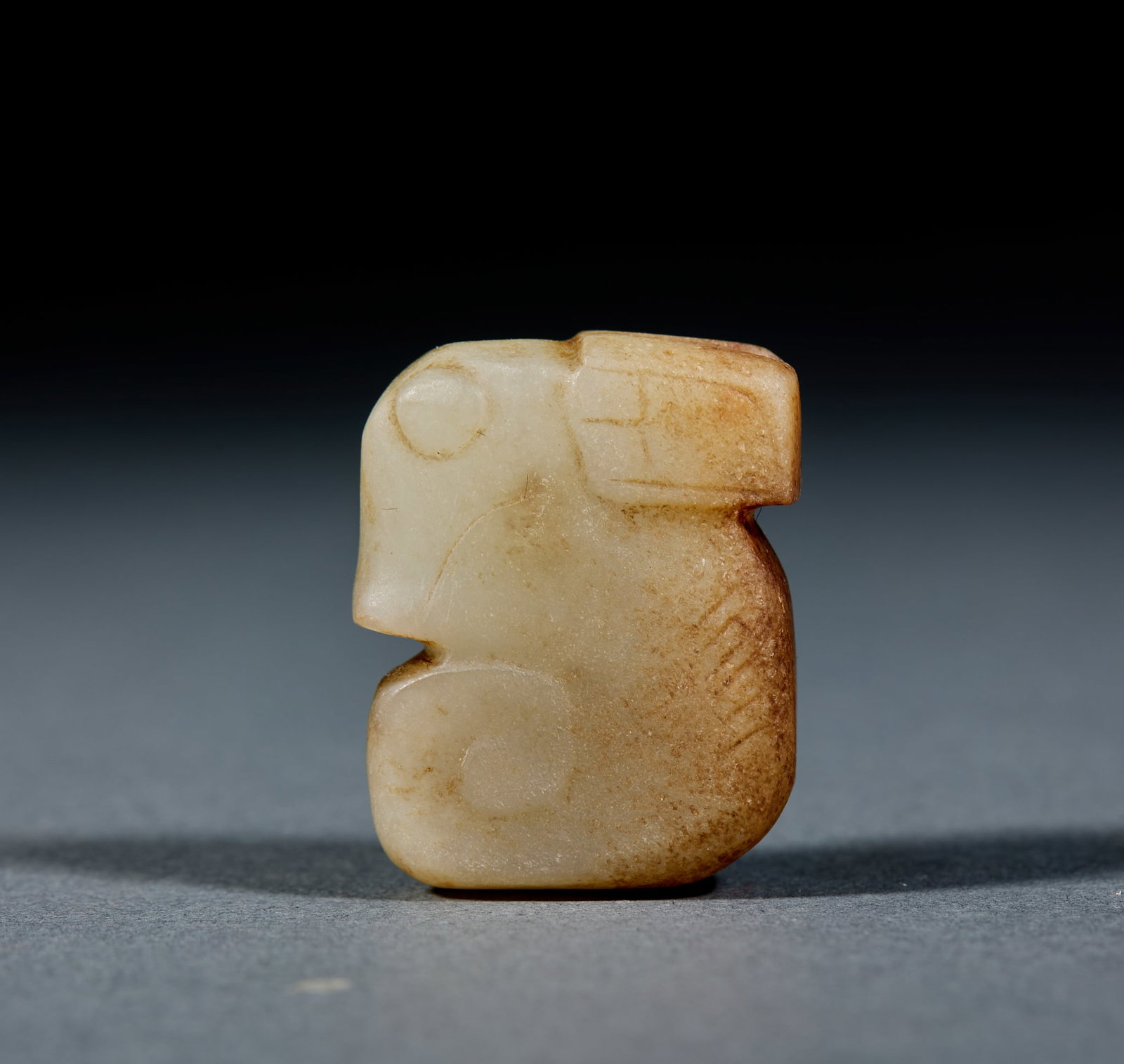 Archaic Jade Rabbit: High Ancient Jade Rabbit: Made of Hetian jade with natural mottling, round carved into small vivid rabbit shape; Length 3.3cm, width 1.2cm, weight 24g; A delicate high ancient jade pendant with