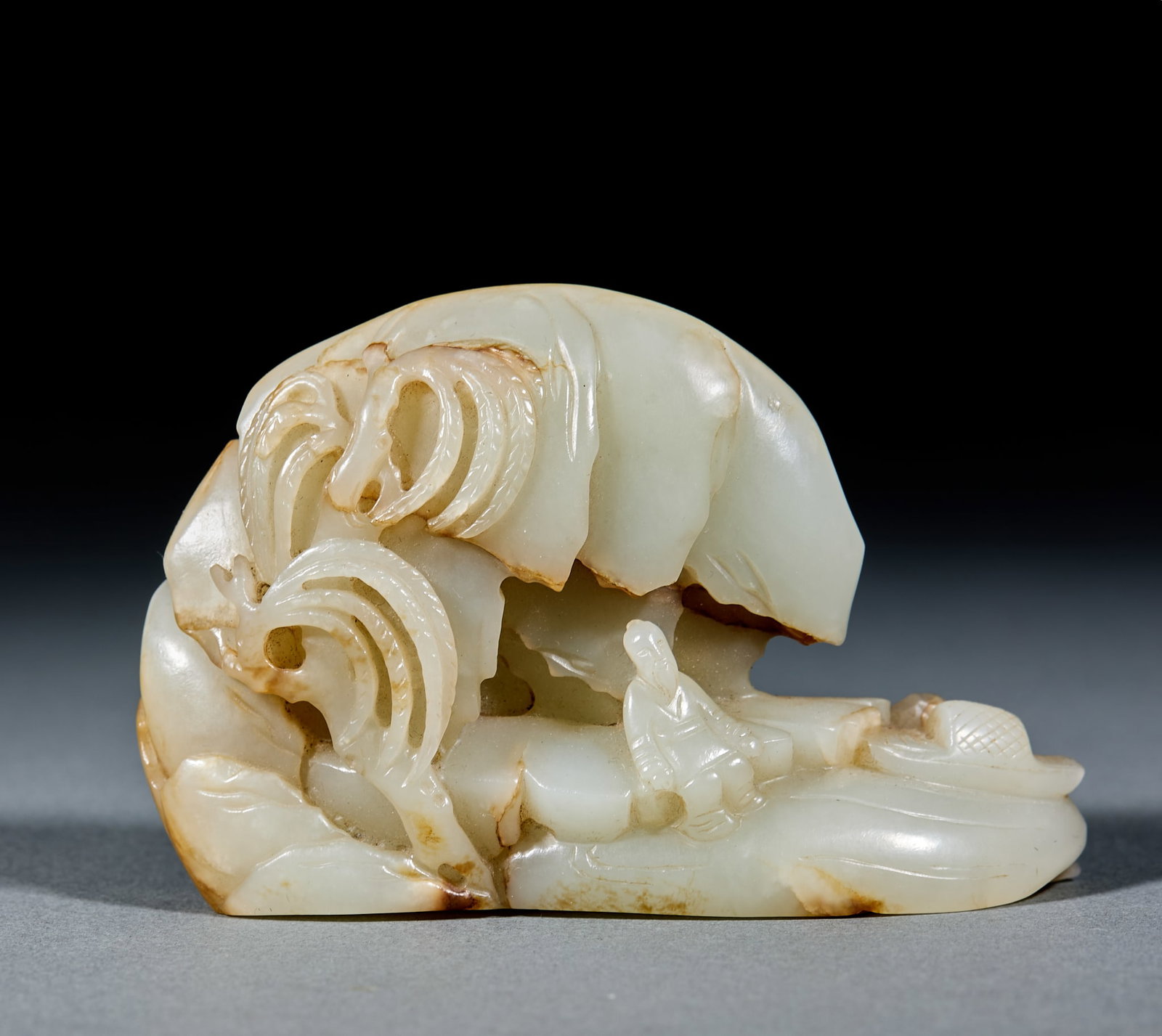 Hetian Jade Ornament: Hetian Jade Ornament: Made of white Hetian jade carved with landscape and figure patterns with distinct layers; Height 6.8cm, length 10.5cm, width 3.4cm, weight 300g; With superb carving craft and