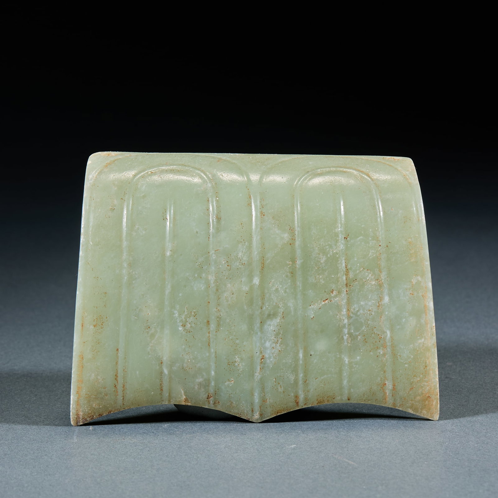 Hongshan Culture Tile-Shaped Jade Hoop: Hongshan Culture Tile-Shaped Jade Hoop: Made of jade with natural mottling, designed in tile shape with plain minimalist style and primitive texture; Length 10.5cm, width 8cm; A typical Hongshan