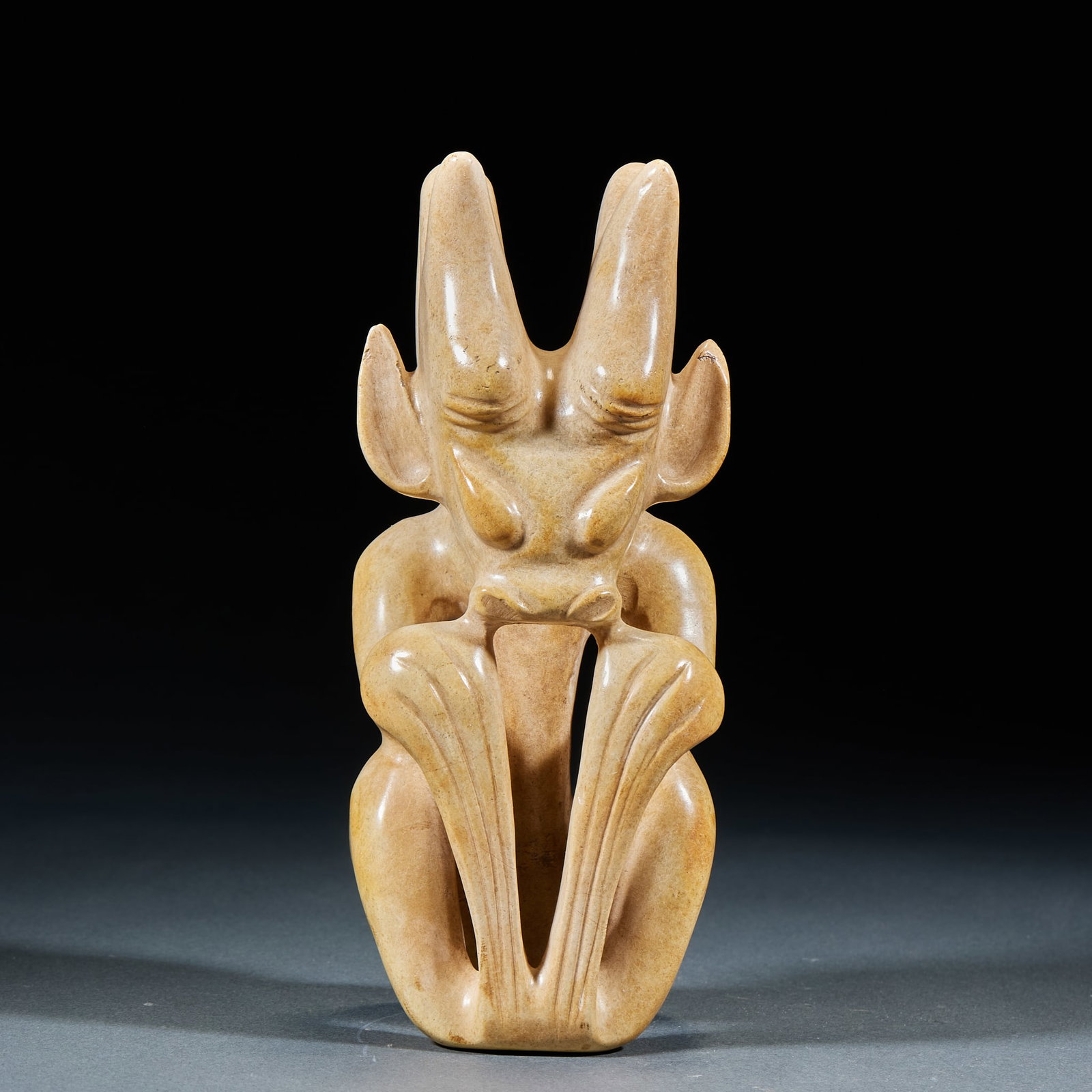 Chicken Bone White Sun God: Chicken Bone White Sun God: Jade fully calcified into chicken bone white tone carved with solemn primitive Sun God statue; Height 17.5cm, length 7cm, width 6cm; A ritual jade artifact of Hongshan