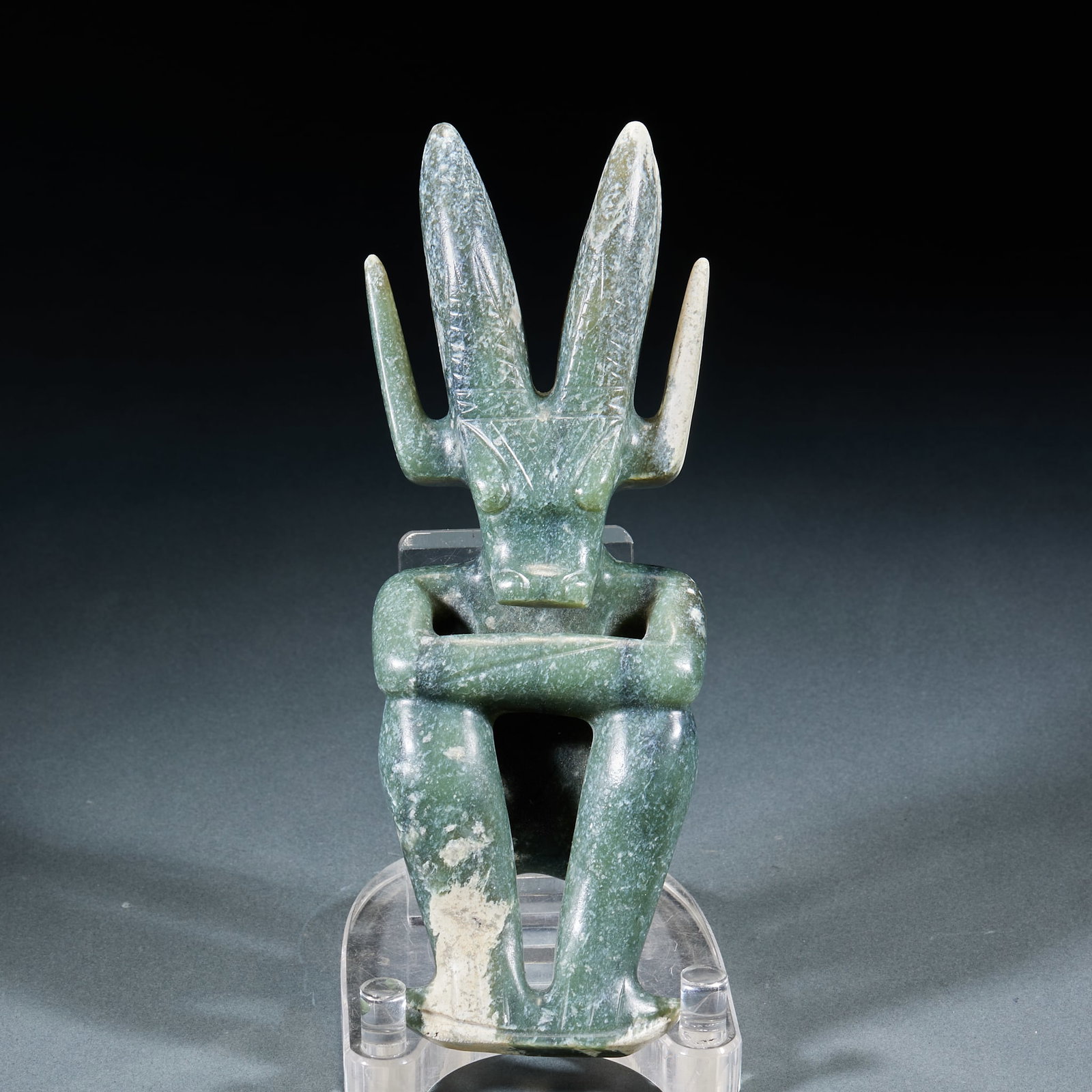 Hongshan Culture Sun God Statue: Hongshan Culture Sun God Figure: Made of jade with natural mottling carved into upright divine figure with tall posture and primitive ornamentation; Height 21cm, length 8cm, width 4cm; A