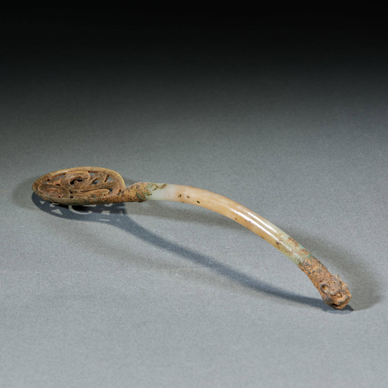Jade Handled Gilt Openwork Incense Spoon: Jade-Handled Gilt Hollow Incense Spoon: Jade handle matched with gilt hollow spoon head decorated with complicated patterns; Length 21cm, width 4.5cm; An elegant ancient incense utensil with