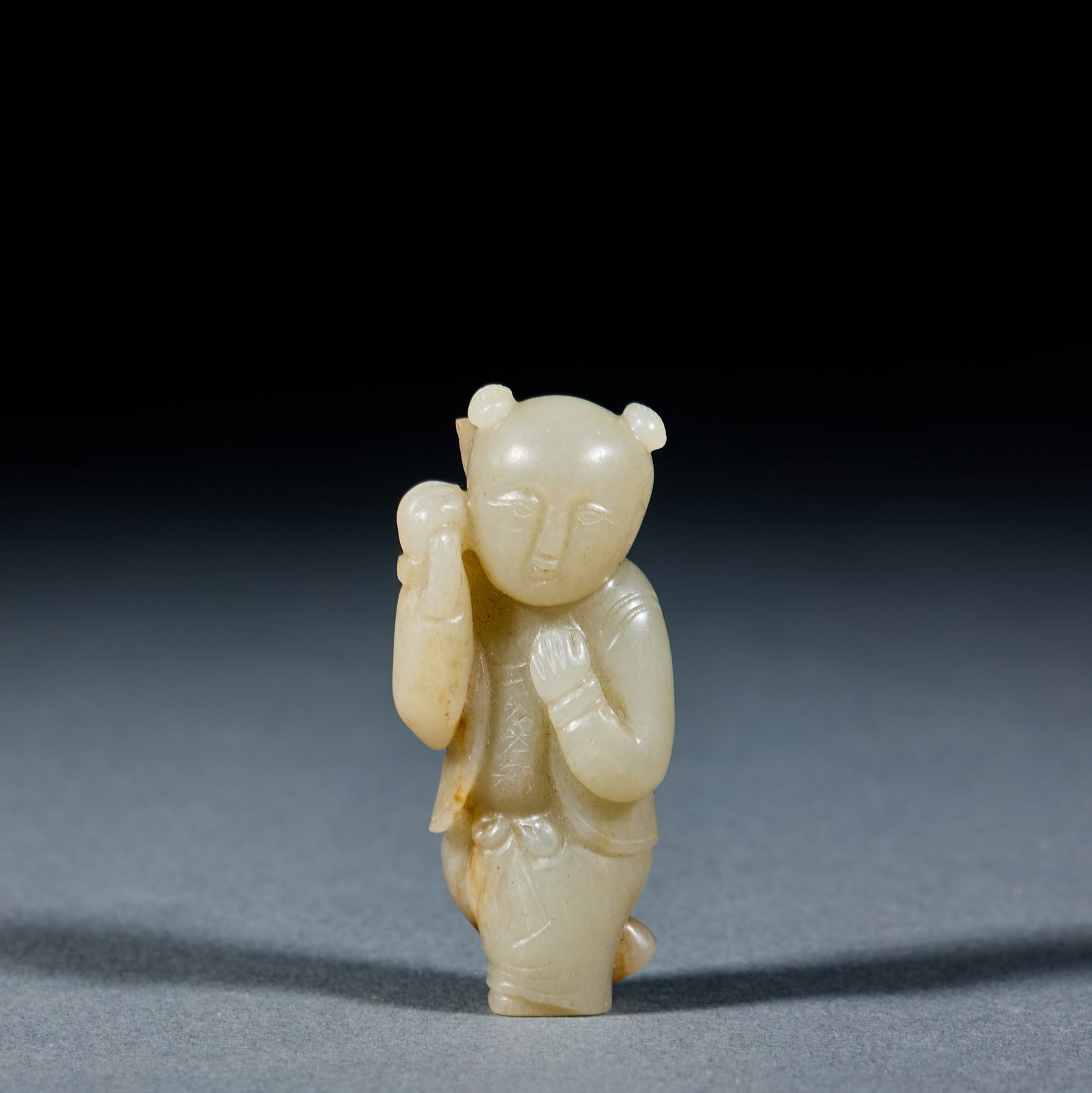 Hetian Jade Lotus Boy: Hetian Jade Lotus Boy: Made of white jade carved with boy and lotus implying successive noble offspring; Height 5.6cm, width 2.5cm, weight 36g; Compact elegant shape and simple carving craft are suita