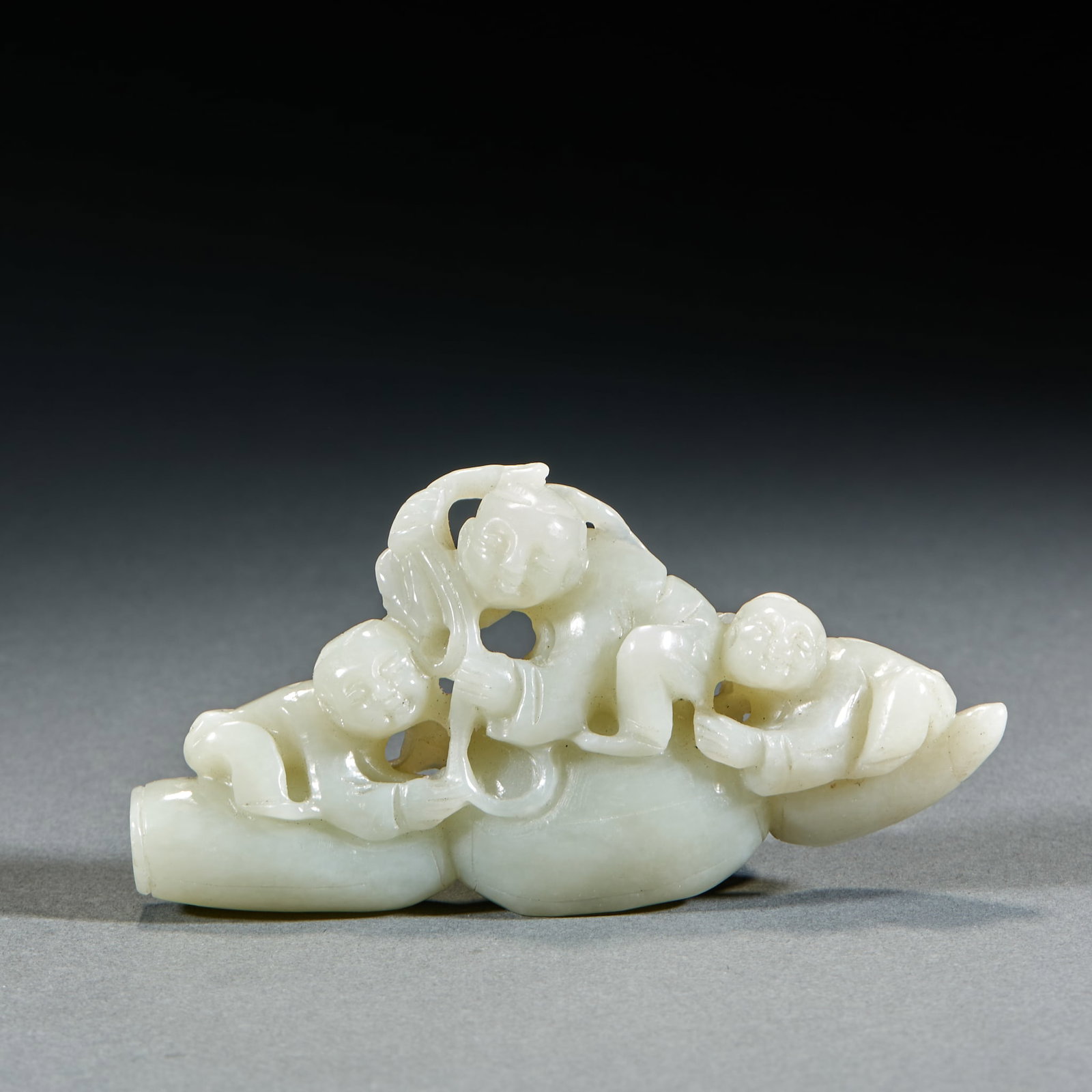 Qing Dynasty Hetian Jade Continuous Noble Blessing Ornament: Qing Dynasty Hetian Jade Continuous Noble Offspring Ornament: Made of white Hetian jade carved with intertwined multiple offspring shape implying successive noble children; Length 12cm, width 6cm,