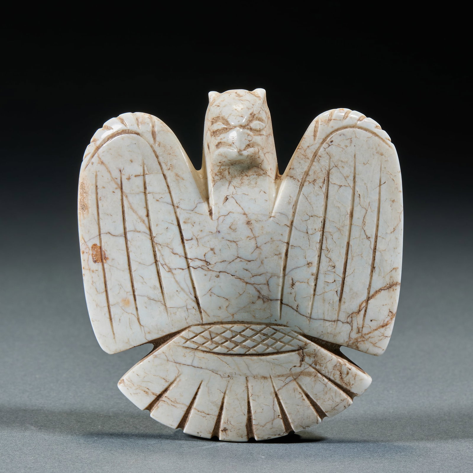 Hongshan Chicken Bone White Jade Owl: Hongshan Culture Chicken Bone White Jade Owl: Jade fully calcified into chicken bone white tone carved with owl shape, a typical ornament of Hongshan Culture; Length 9cm, width 8.4cm, weight 200g;