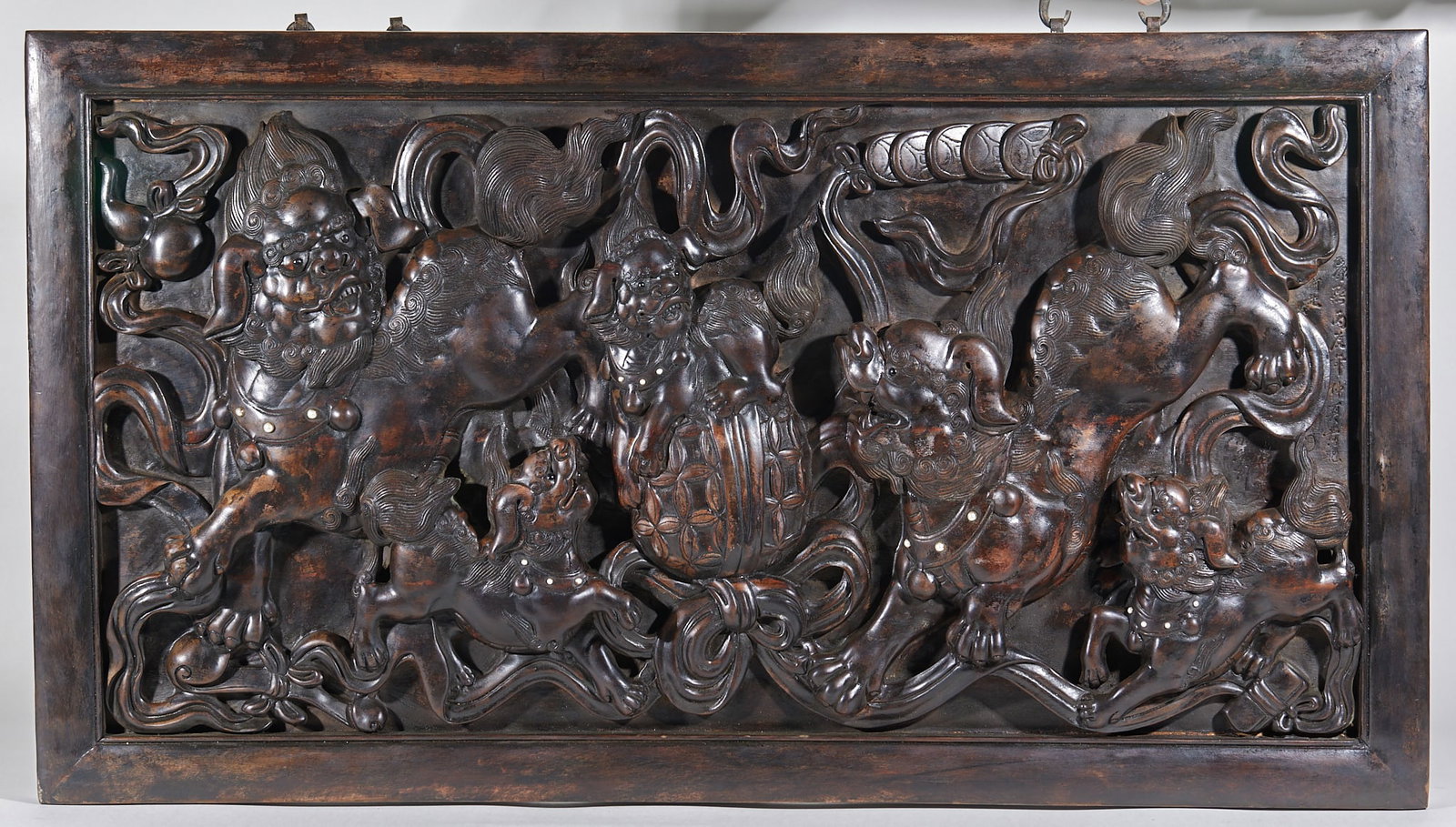 Agarwood Lion Playing Hydrangea Hanging Screen: Agarwood Lion Playing with Hydrangea Hanging Screen: Fully carved from whole agarwood board adopting deep relief technique, depicting lion playing with hydrangea in complicated vivid lines and thick
