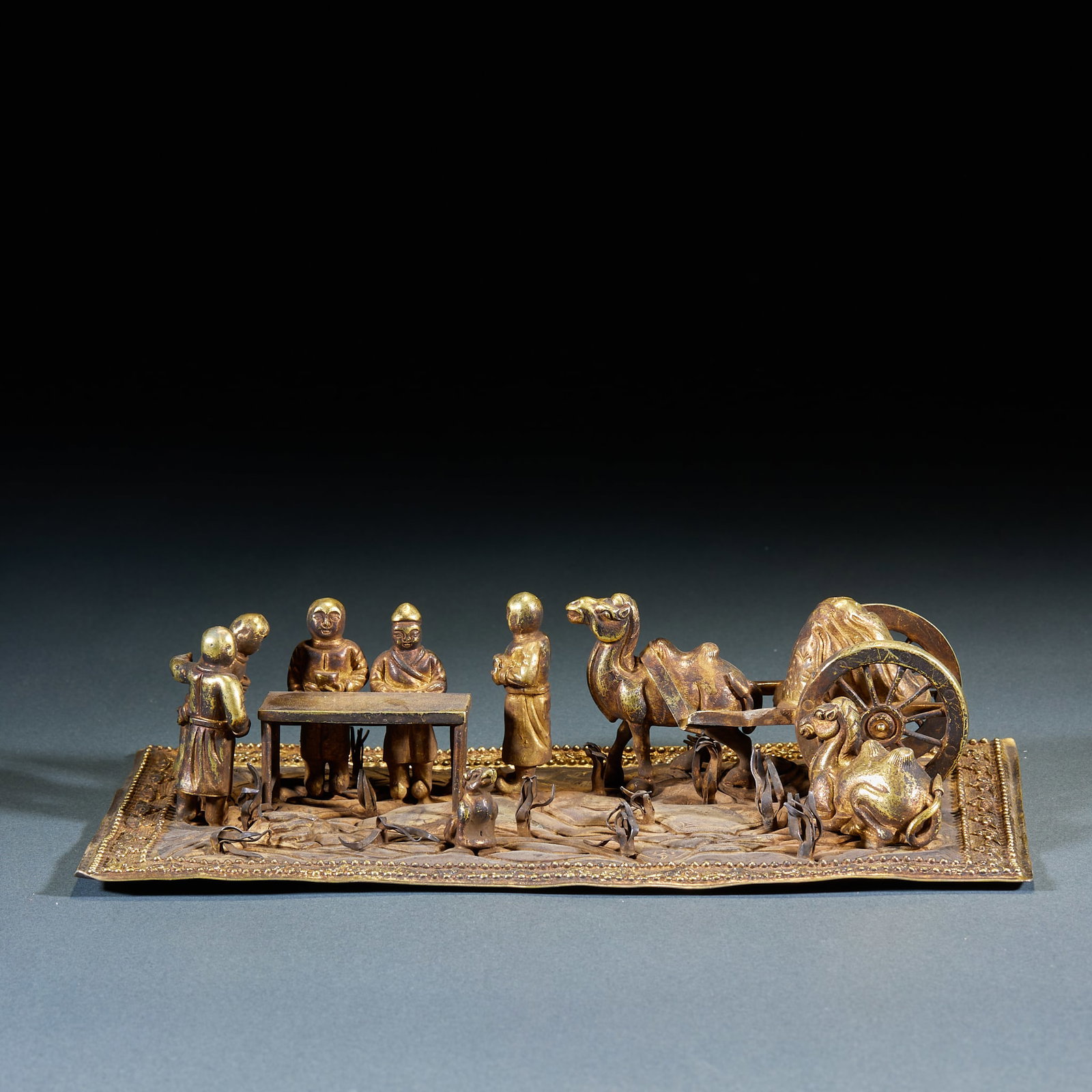 Gilt Silver Hu Hunting Ornament: Gilt Silver Hu People Hunting Relief Plaque: Crafted with silver base and overall gilding, adopting three-dimensional relief and chiseling techniques to depict Hu people hunting scenes with vivid