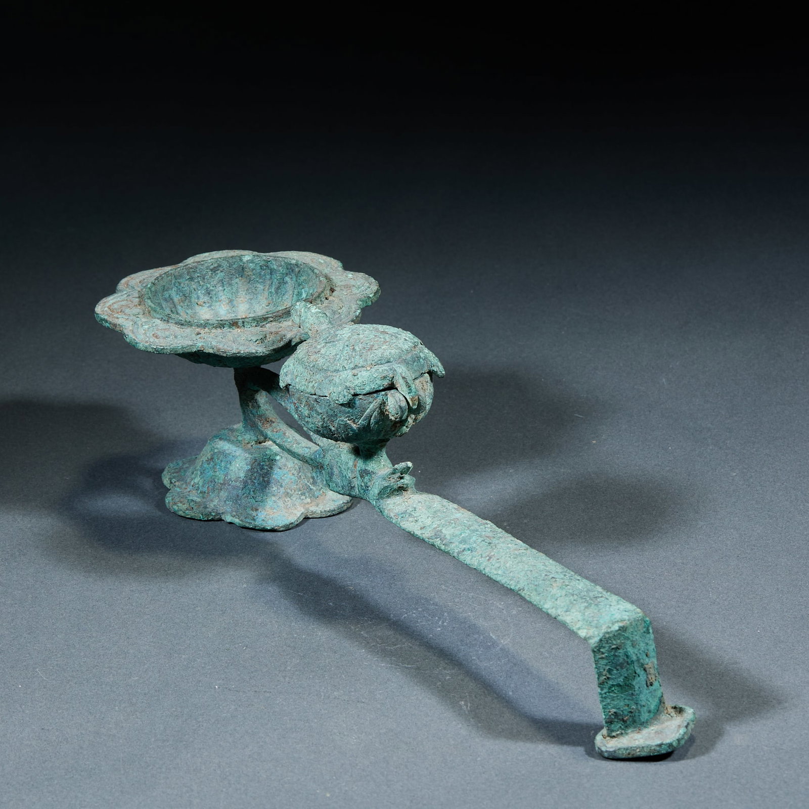 Bronze Longevity Turtle Handheld Candlestick: Bronze Longevity Turtle Candlestick: Cast in bronze with a turtle-shaped handle symbolizing longevity, practical and elegant as a candlestick; Height 6.5cm, length 25cm, width 8cm; An ancient daily