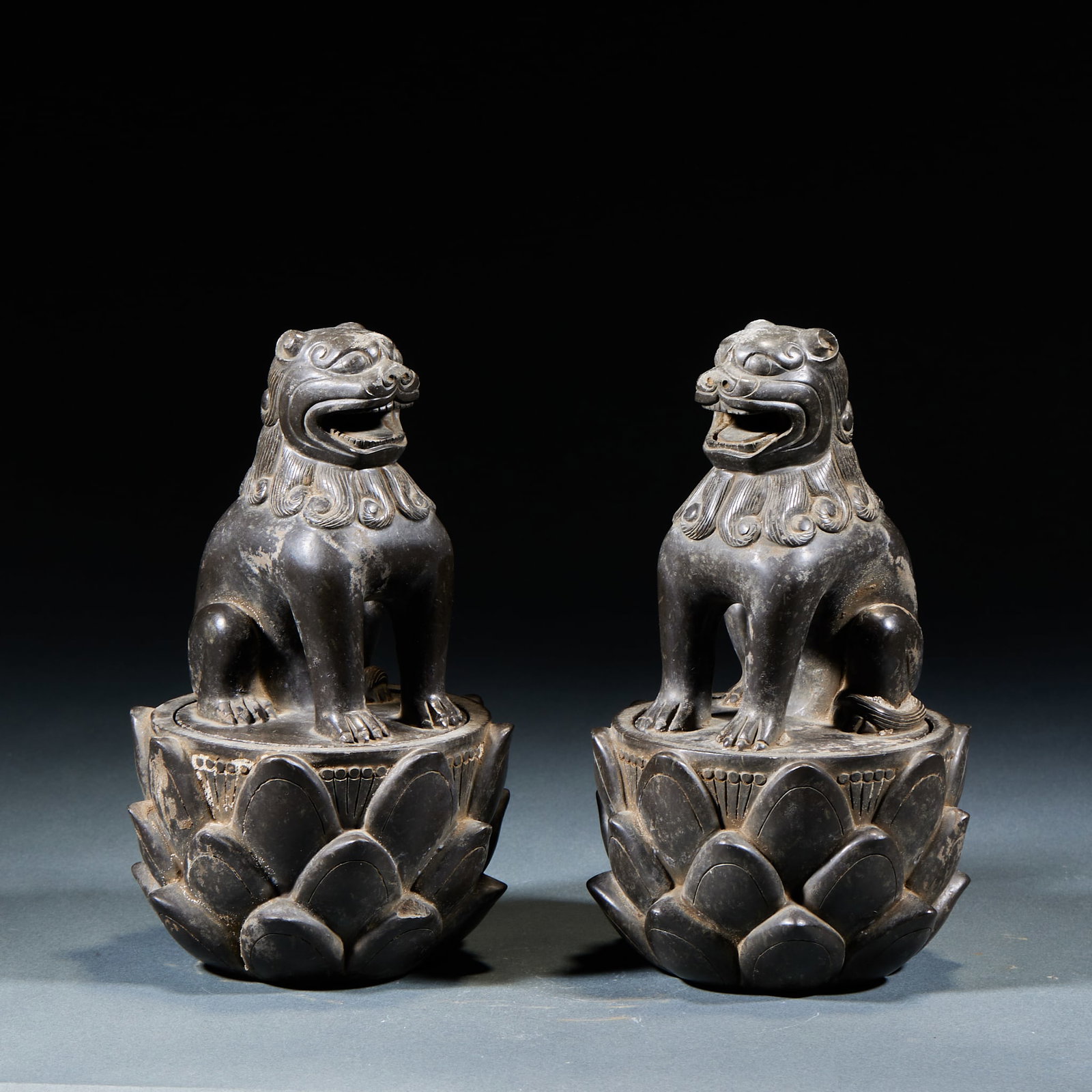 Jet Stone Lion Knob Incense Burner, A Pair: Pair of Jet Stone Lion Knob Incense Burners: Made of jet stone carved with lion knob cover and relief patterns on the body, solemn in shape and preserved as a pair; Height 18cm, diameter 10cm; Possess