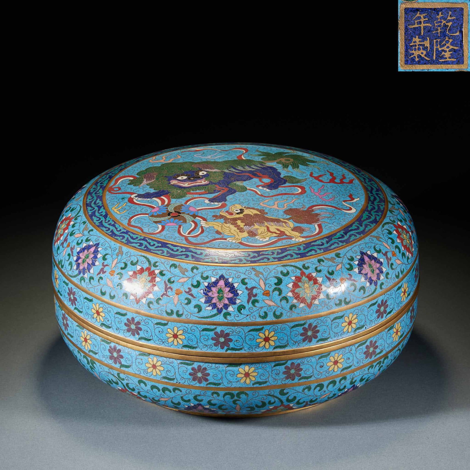 Qianlong Mark Cloisonné Flower Lion Playing Hydrangea Cover Box: Qianlong Mark Cloisonné Flower and Lion Playing with Hydrangea Cover Box: Copper-bodied cloisonné with blue glaze background, wire inlaid and color filled with flower patterns and lion playing with 