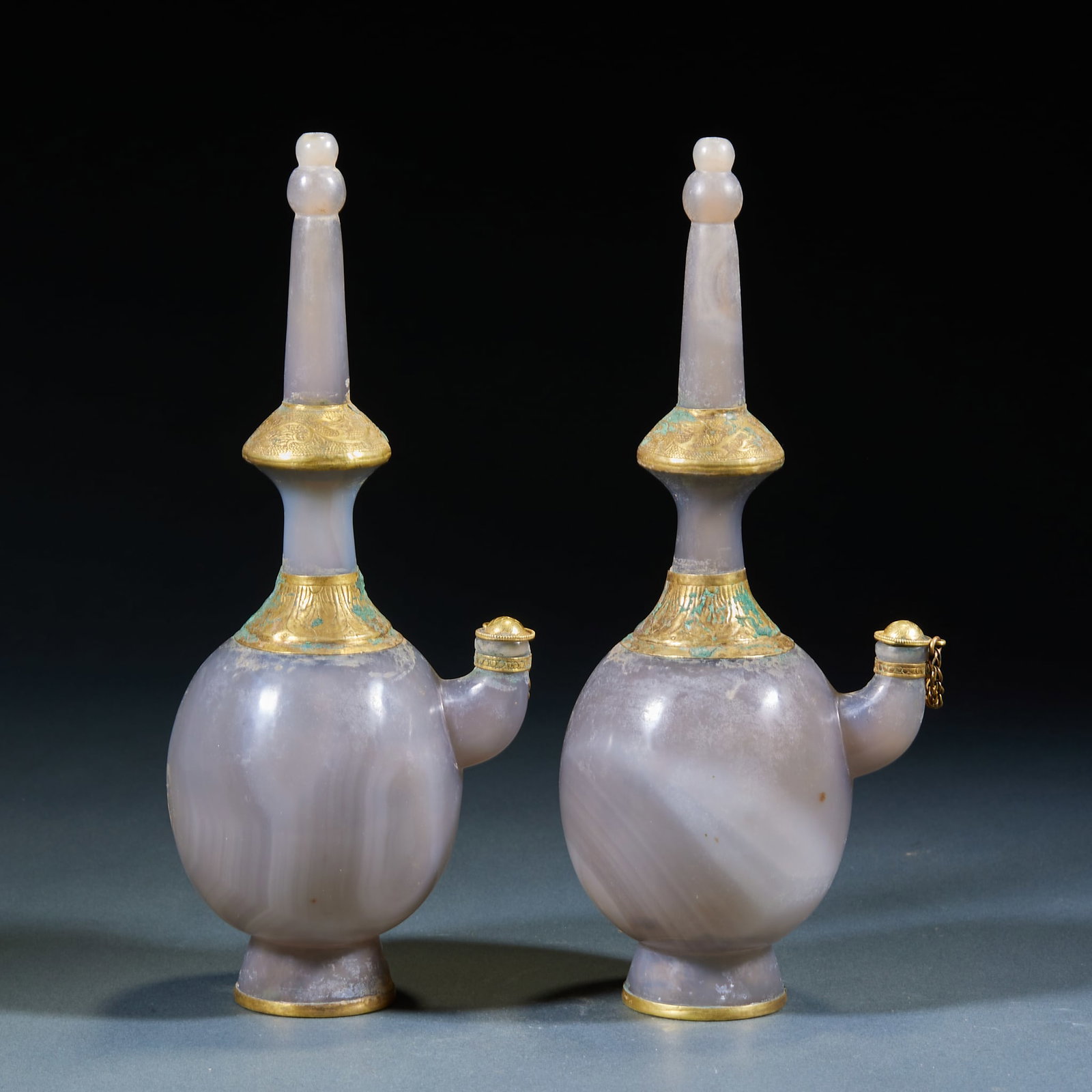 Agate Gold Wrapped Vase, A Pair: Pair of Gold Wrapped Agate Vases: Made of agate with plain smooth body and overall gold wrapped edge decoration, fine gilt lines; Height 23.5cm, diameter 9.5cm; Precious Buddhist ritual utensils with 