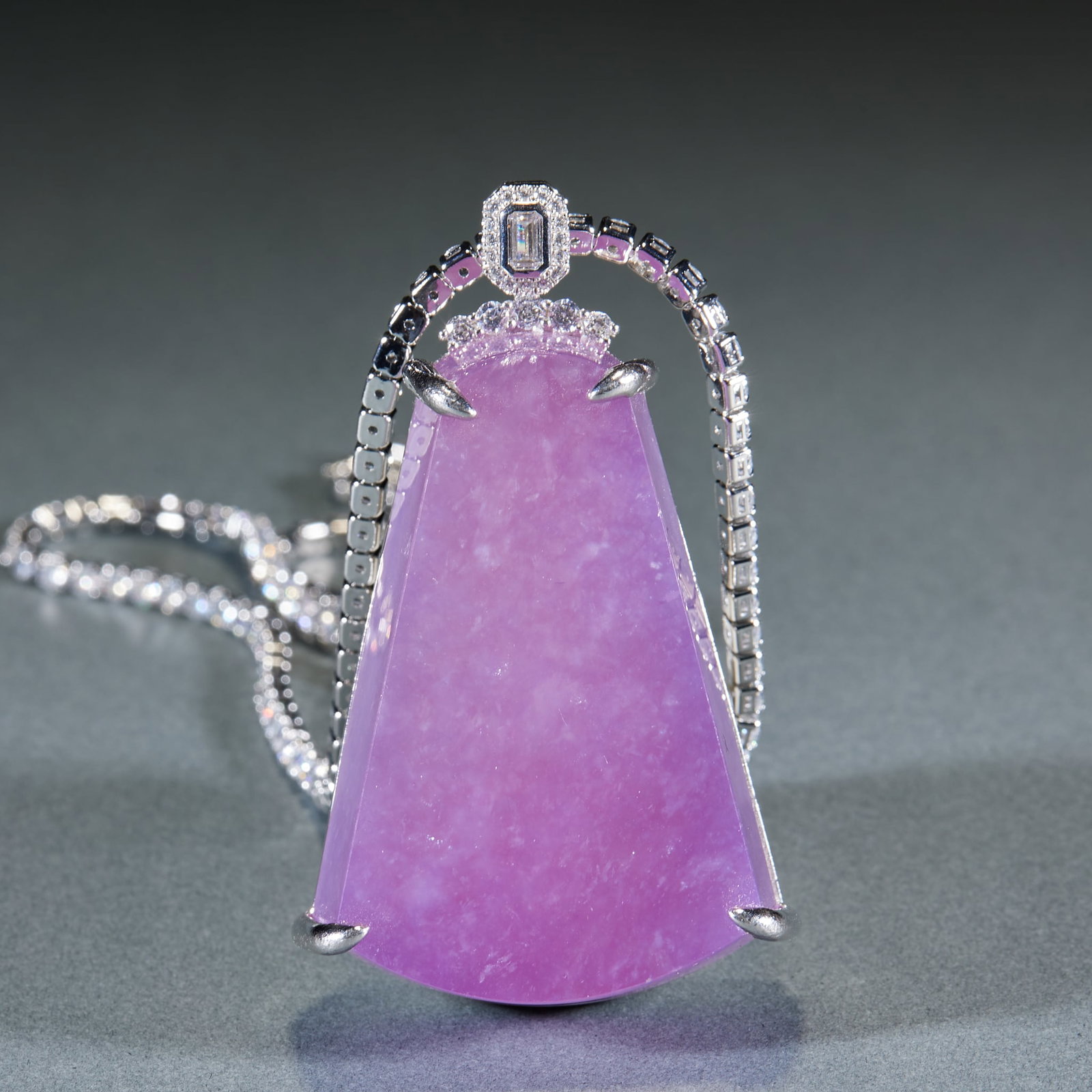 Violet Jadeite Plain Plaque Pendant, Sterling Silver Mount: Violet Plain Plaque Pendant: Natural violet jadeite plain plaque with rich even hue, mild transparent texture and plain surface, bordered with sterling silver diamond and pink gem inlay fitted with di