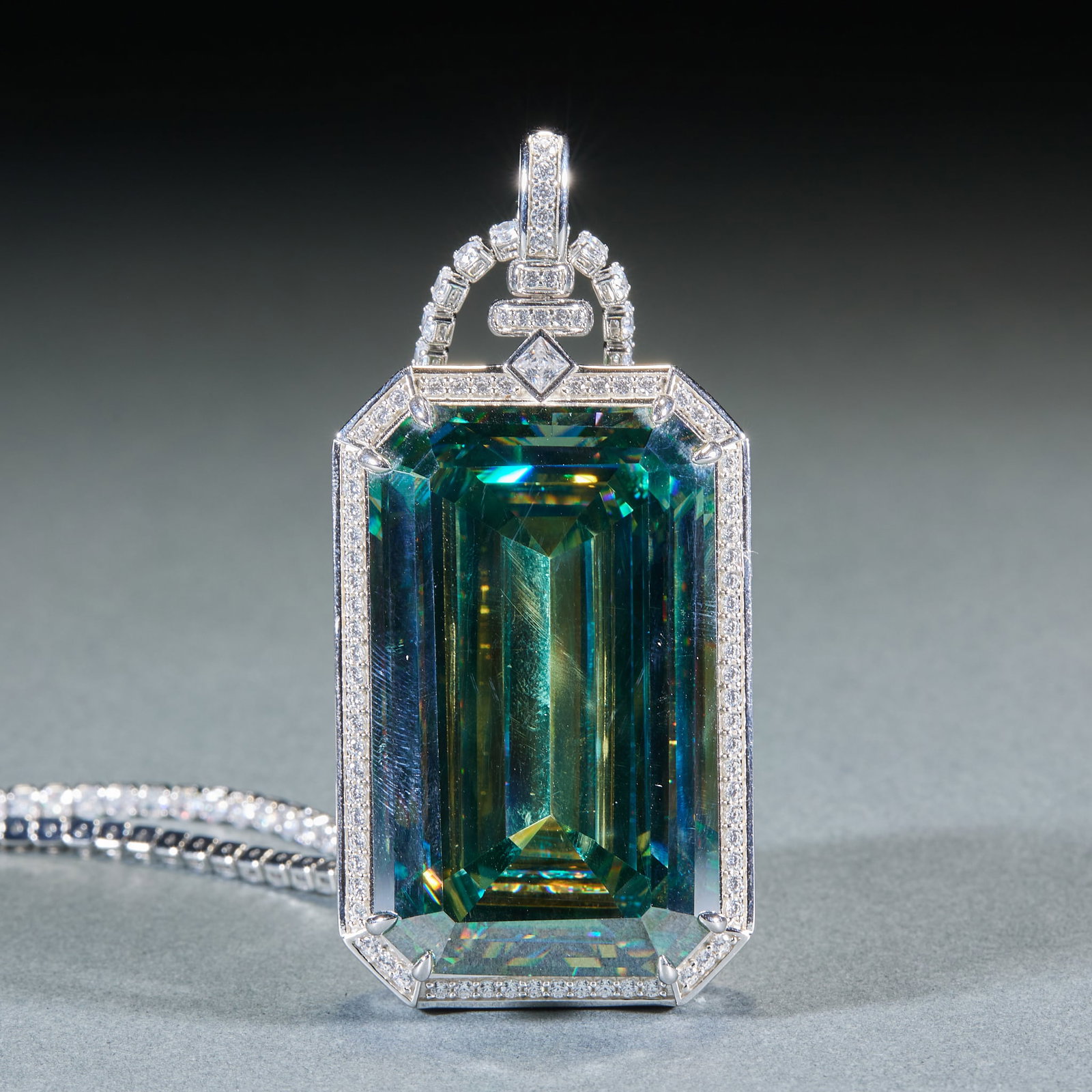 Diamond Plain Plaque, Sterling Silver Mount: Diamond Plain Plaque Pendant: Square-cut colored gem main stone with brilliant luster, bordered with sterling silver diamond inlay and diamond hanging buckle; Length 5.7cm, width 3.7cm, weight 88g; Pl