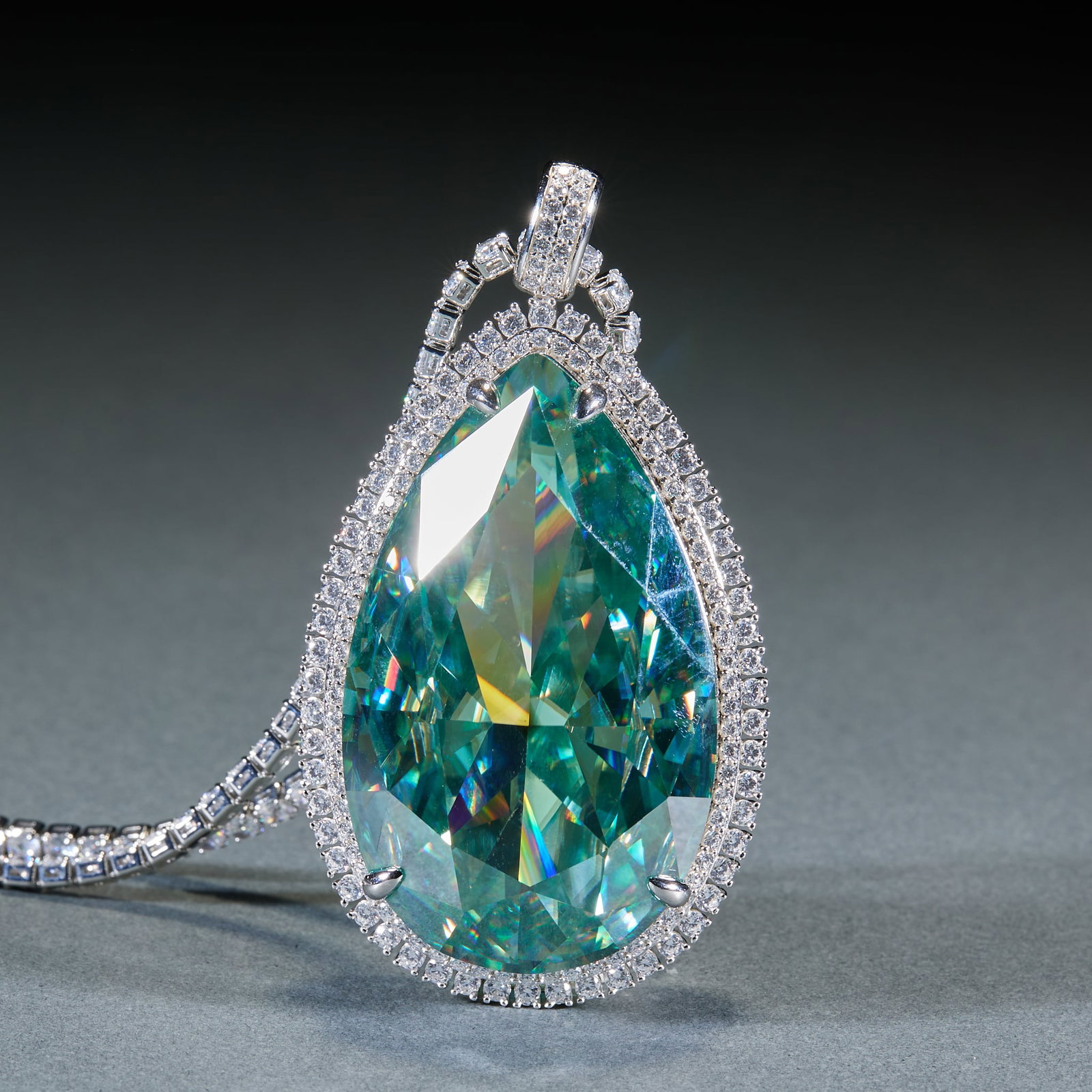 Diamond Pendant, Sterling Silver Mount: Diamond Pendant: Teardrop-cut colored gem main stone with transparent luster and brilliant fire, bordered with sterling silver diamond inlay and diamond hanging buckle; Length 7cm, width 3.8cm, weight
