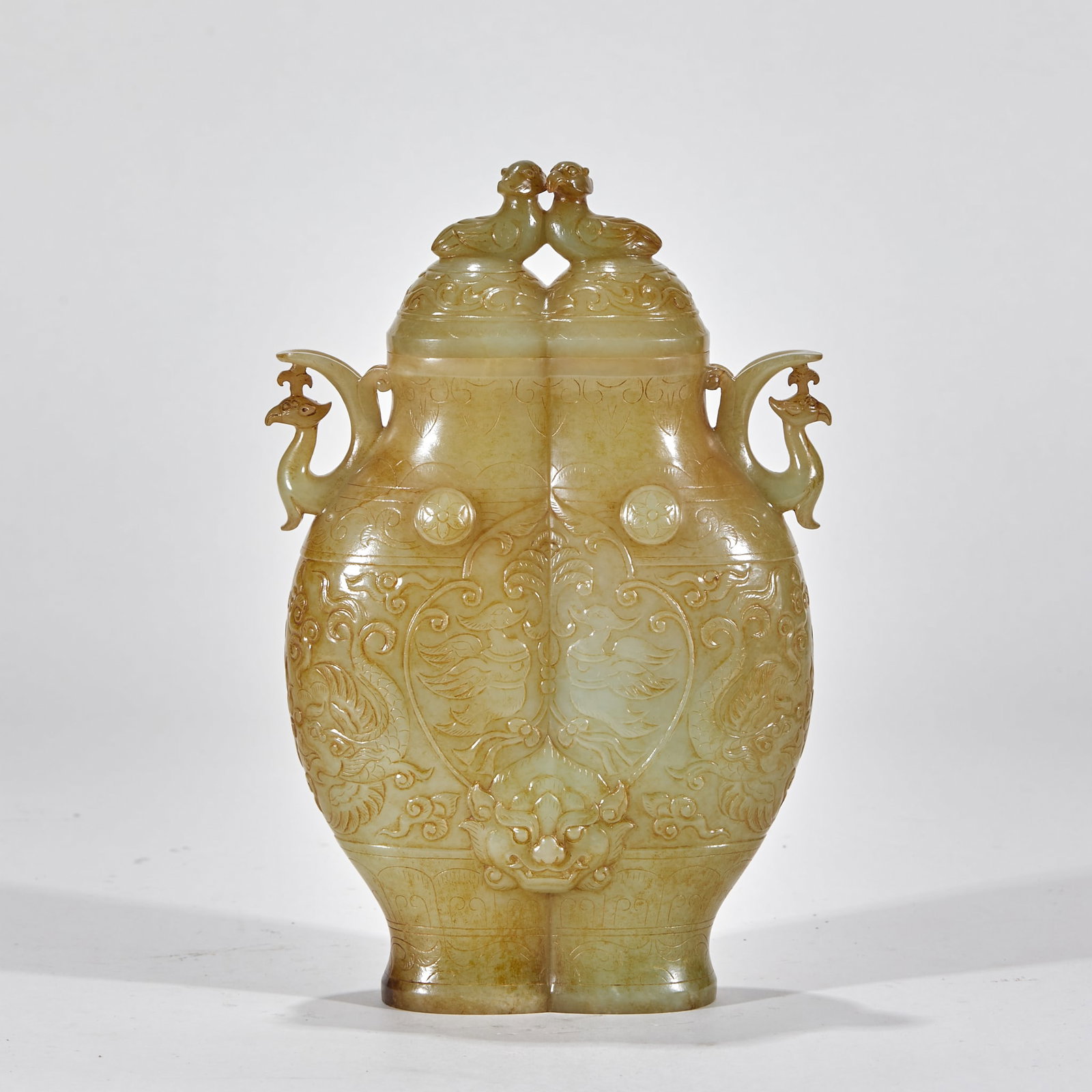 Hetian Jade Vase with Crane and Double Fish Pattern: Hetian Double-Lidded Twin Vase with Yellow Seepage, Dragon, Phoenix and Double Fish Patterns. Hollowed integrally from a single piece of Hetian bluish white jade, the whole surface bears natural ancie