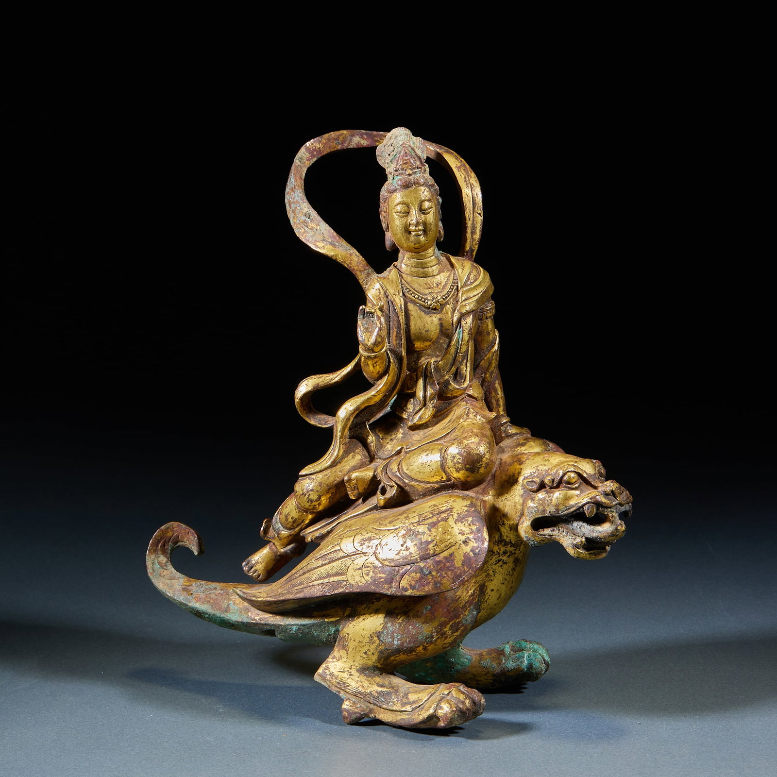 Gilt Bronze Statue of Guanyin: Gilt Bronze Guanyin Statue Riding Auspicious Beast, integrally cast via piece-mold refined bronze with thick intact gilding, finely dense lines chiseled on flowing robes, jeweled necklaces and pearls,
