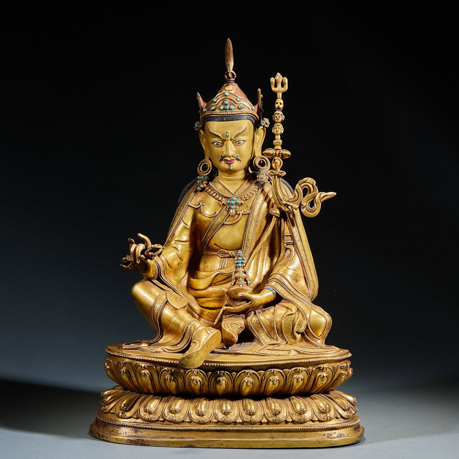 Gilt Bronze Statue of Padmasambhava: Gilt Bronze Statue of Padmasambhava, fully gilded bronze body crafted with standard Tibetan statue technique, Master Padmasambhava sits in royal ease on a double-layered upward and downward lotus