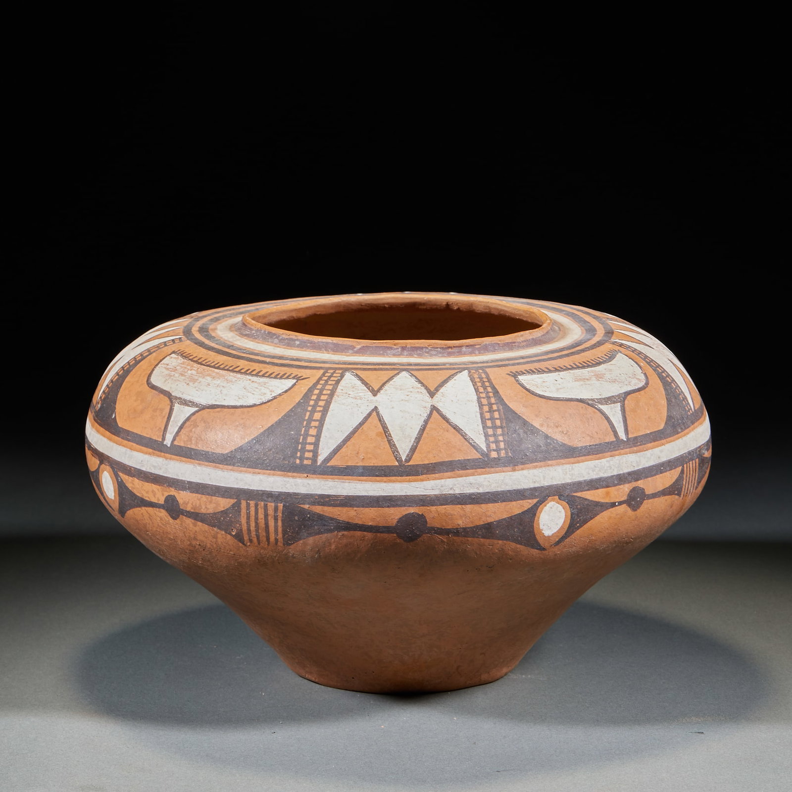 Yangshao Culture Painted Pottery Jar with White Frog Pattern: Yangshao Culture Painted Pottery Jar with Frog Patterns in White Pigment, hand-made fired red pottery, in flat round full form with inward-curving rim, the outer wall painted with frog patterns and ge