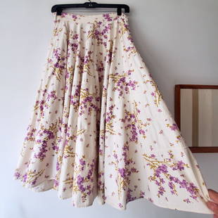 Vintage 1950s Horizontal Piped Cotton Floral Circle Skirt (Reserve $50): Style #: V3PSKW21 Label: Not Available Manufactured: USA Fabric: Cotton Color: Ivory | Lilac Floral Condition: Very Good Used Vintage Size: Not Available Waist: 13 1/2" Hip: Free Length: 32