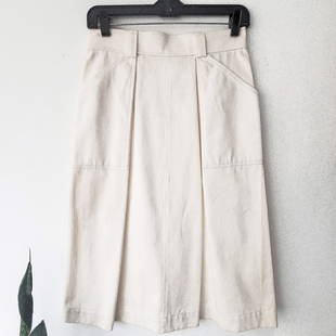 RARE Vintage 1960s-70s NOS YVES ST LAURENT RIVE GAUCHE Button Front Skirt (Reserve $50): Style #: V3PSKW176 Label: YVES ST LAURENT RIVE GAUCHE Manufactured: France Fabric: Cotton Color: Ivory Condition: Excellent NOS Vintage (Appearing Unused) Size: Not Available Waist: 14" Hip: Free Leng