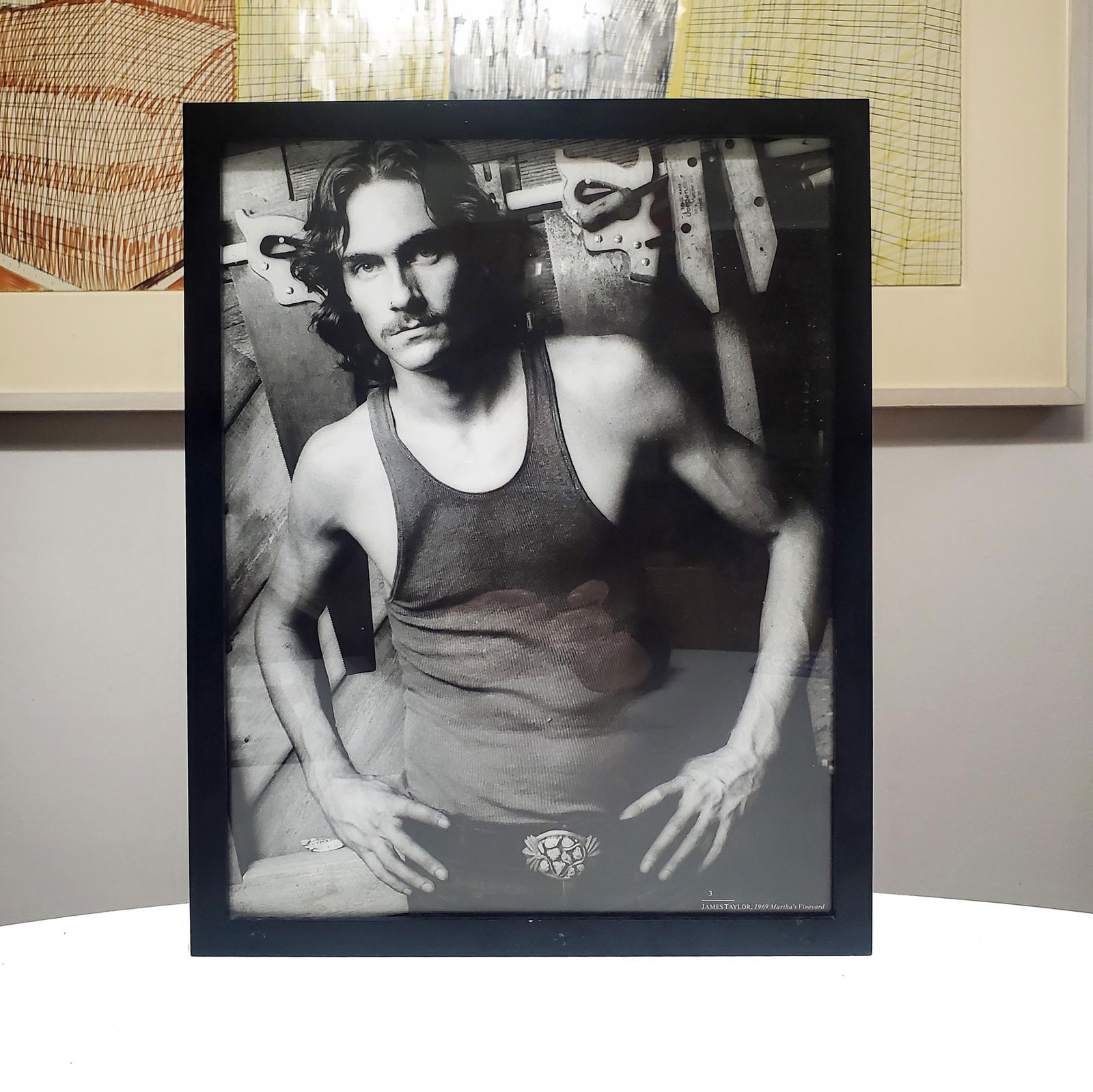 Framed Vintage 1969 'JAMES TAYLOR' 11x14 Book Photo Print (Reserve $30): Vintage Photo Print Rescued from Out of Print Coffee Table Book Photographer: Norman Seeff Size: 11x14 w/11 3/4 x 14 3/4 Black Frame Condition: Very Good Vintage w/One Unfinished Edge Resulting from R