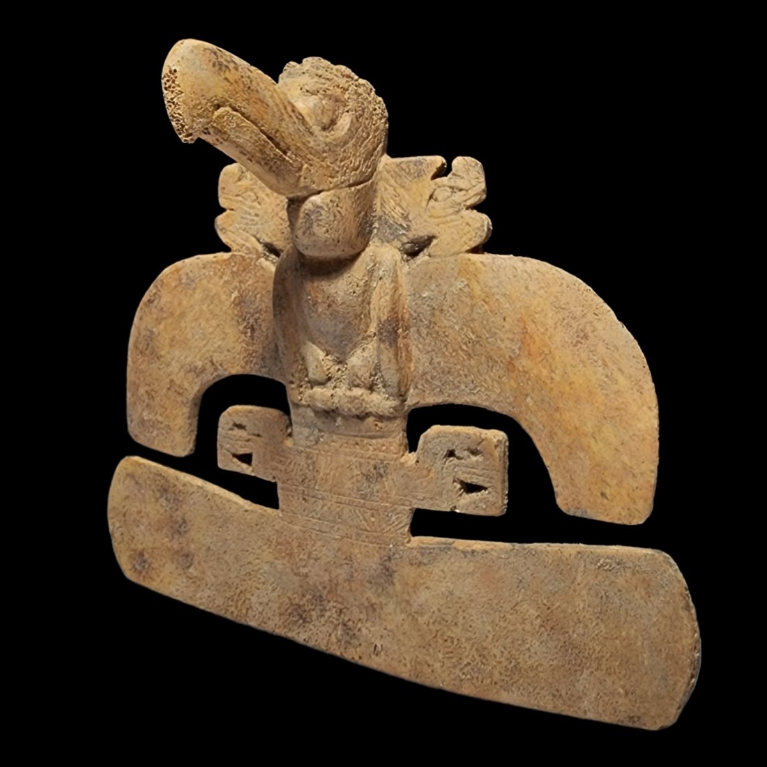 Pre-Columbian Tairona Style Bone Bird pectoral: Pre-Columbian Tairona Style Bone Bird pectoral from Colombia, ca. 800-1000 CE. Carved animal bone in the shape of a pectoral with a bird and incised decoration. 5 7/8" in height.