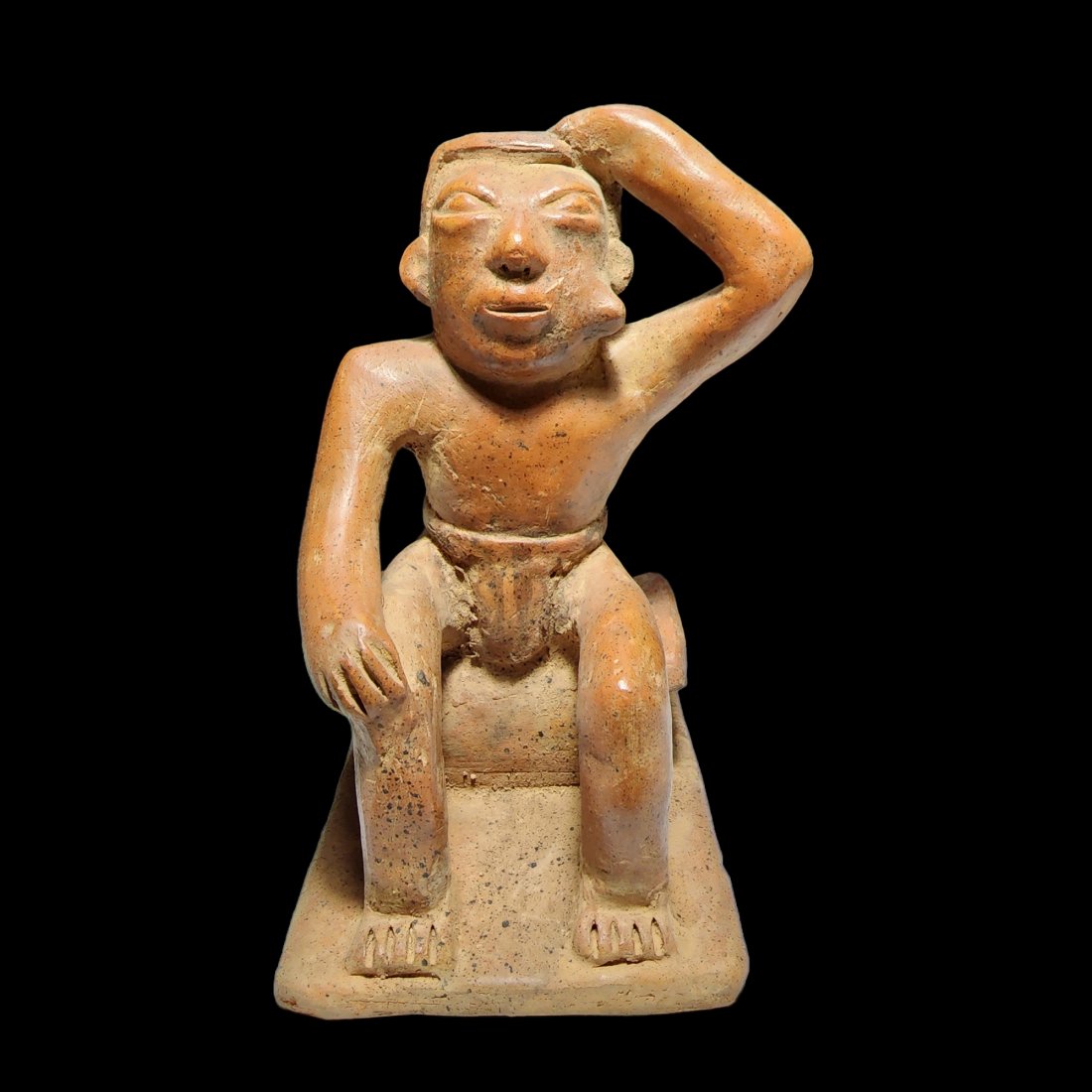 Pre--Columbian Narino Style Coquero Seated Figure: Pre--Columbian Narino Coquero Seated Figure from Colombia, ca. 800 CE. 7 3/4"