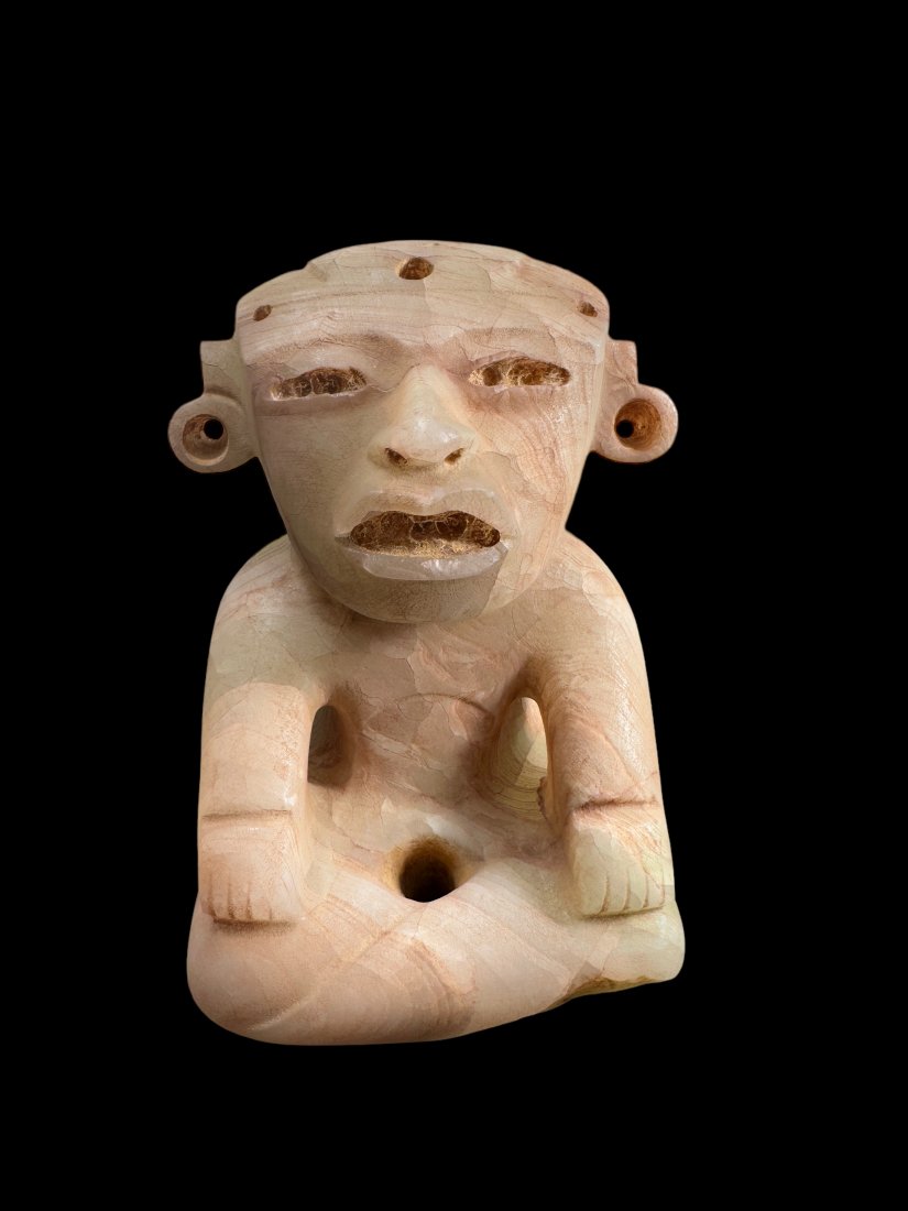 Pre-Columbian Teotihuacan Alabaster seated figure: Pre-Columbian Teotihuacan Alabaster seated figure from Mexico, ca. 600-800 CE. Seated alabaster figure with earspools. 7 1/4" height.