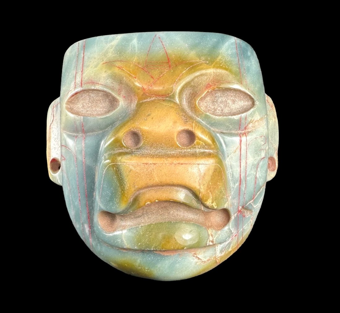 Pre-columbian Olmec jade incised mask (1 of 2)
