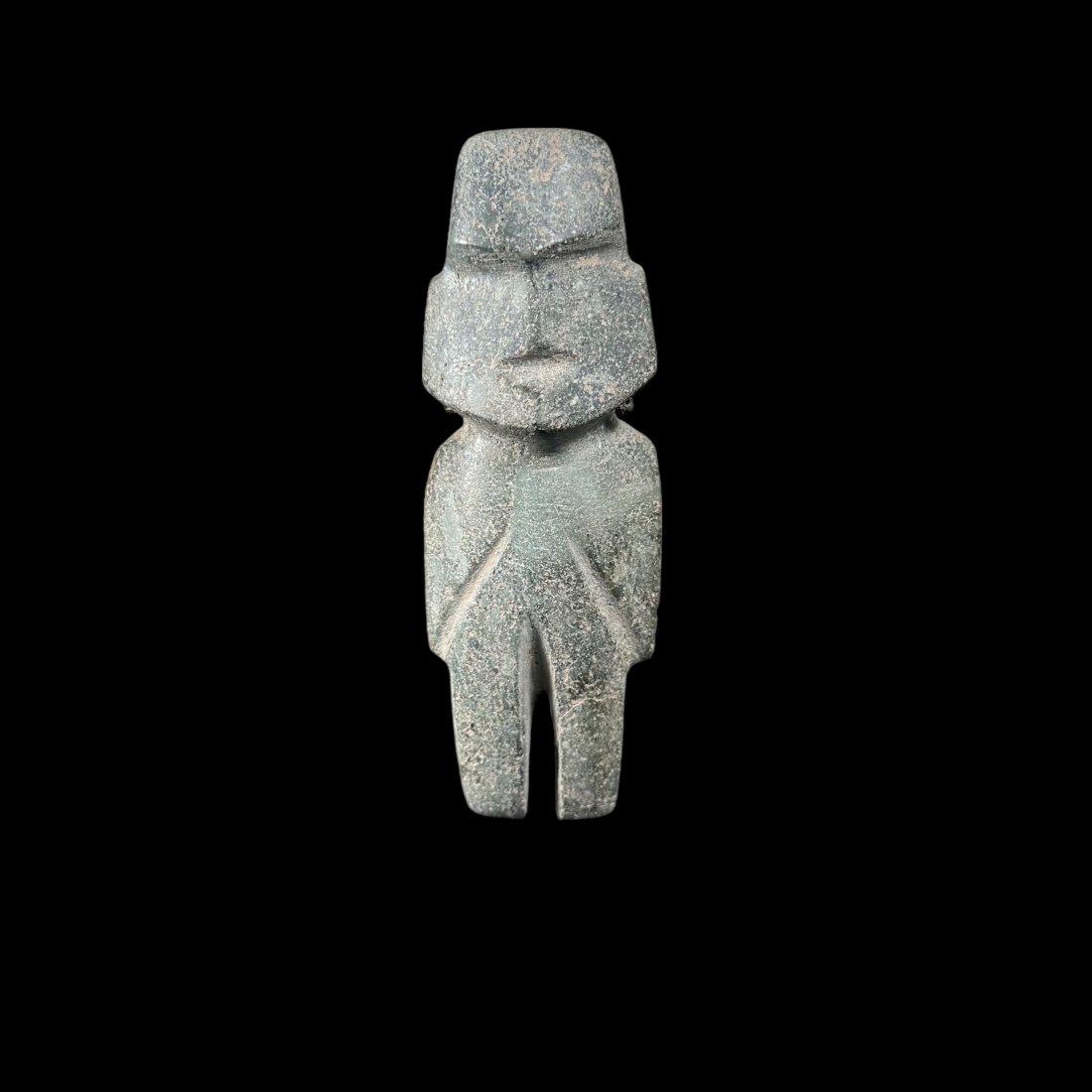 Pre-Columbian Mezcala green stone figure: Pre-Columbian Mezcala green stone figure from Guerrero, Mexico, ca. 400-100 BCE. Standing figure with string cut details. Stand included. 6" height. Ex. Kevern Gregory, Fl. Ex. Luis Merida, Florida, E