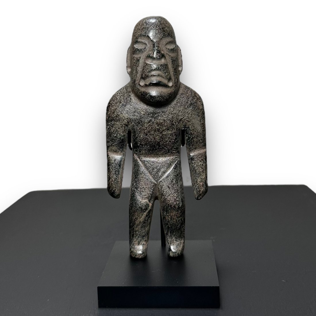 Pre-Columbian Olmec standing serpentine figure (1 of 2)