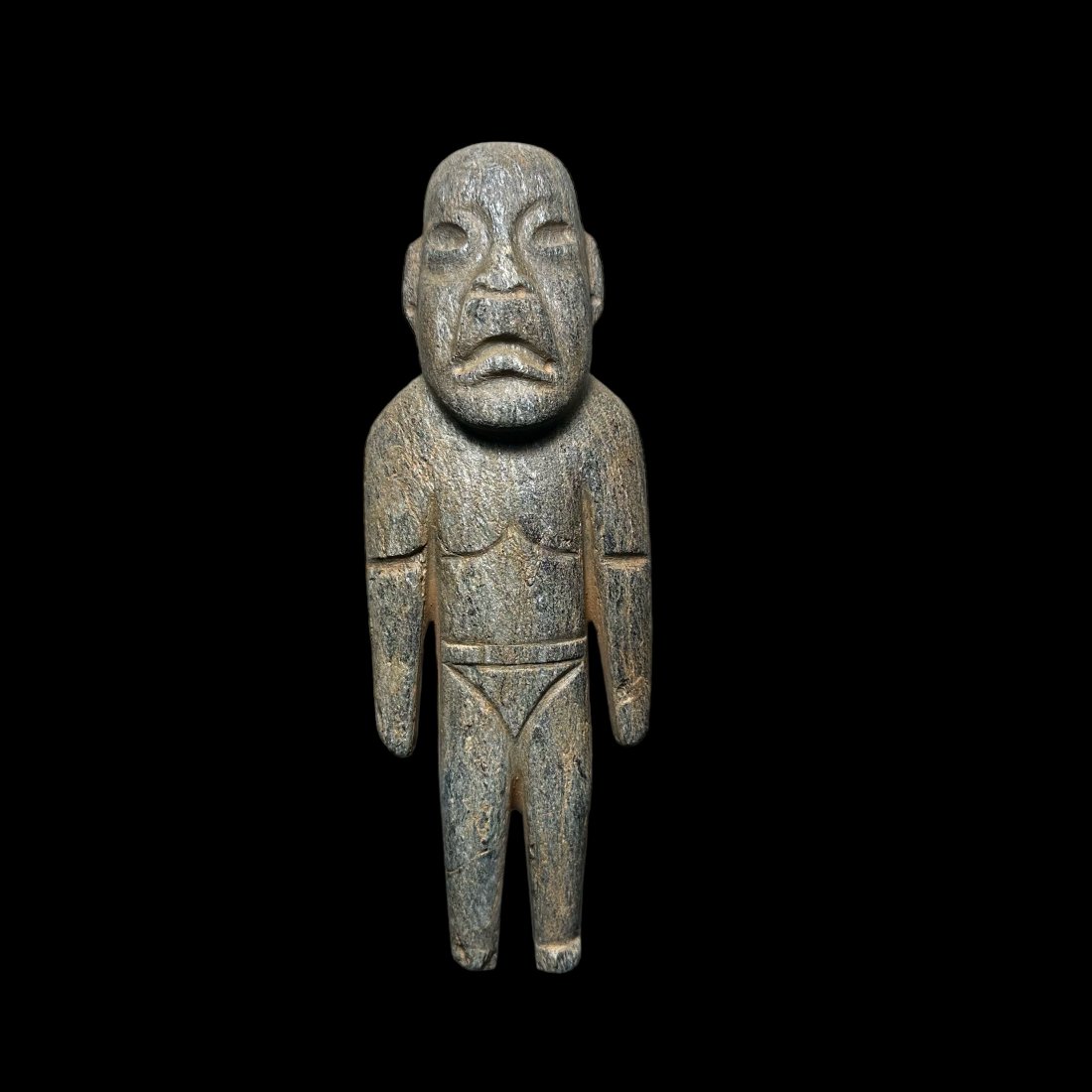 Pre-Columbian Olmec serpentine figure: Pre-Columbian Olmec serpentine figure from Mexico, ca. 900-600 BCE. Standing figure with arms held to its side. 8-3/8" height. Ex. Kevern Gregory, Fl. Ex. Luis Merida, Florida, Ex. Private Florida col