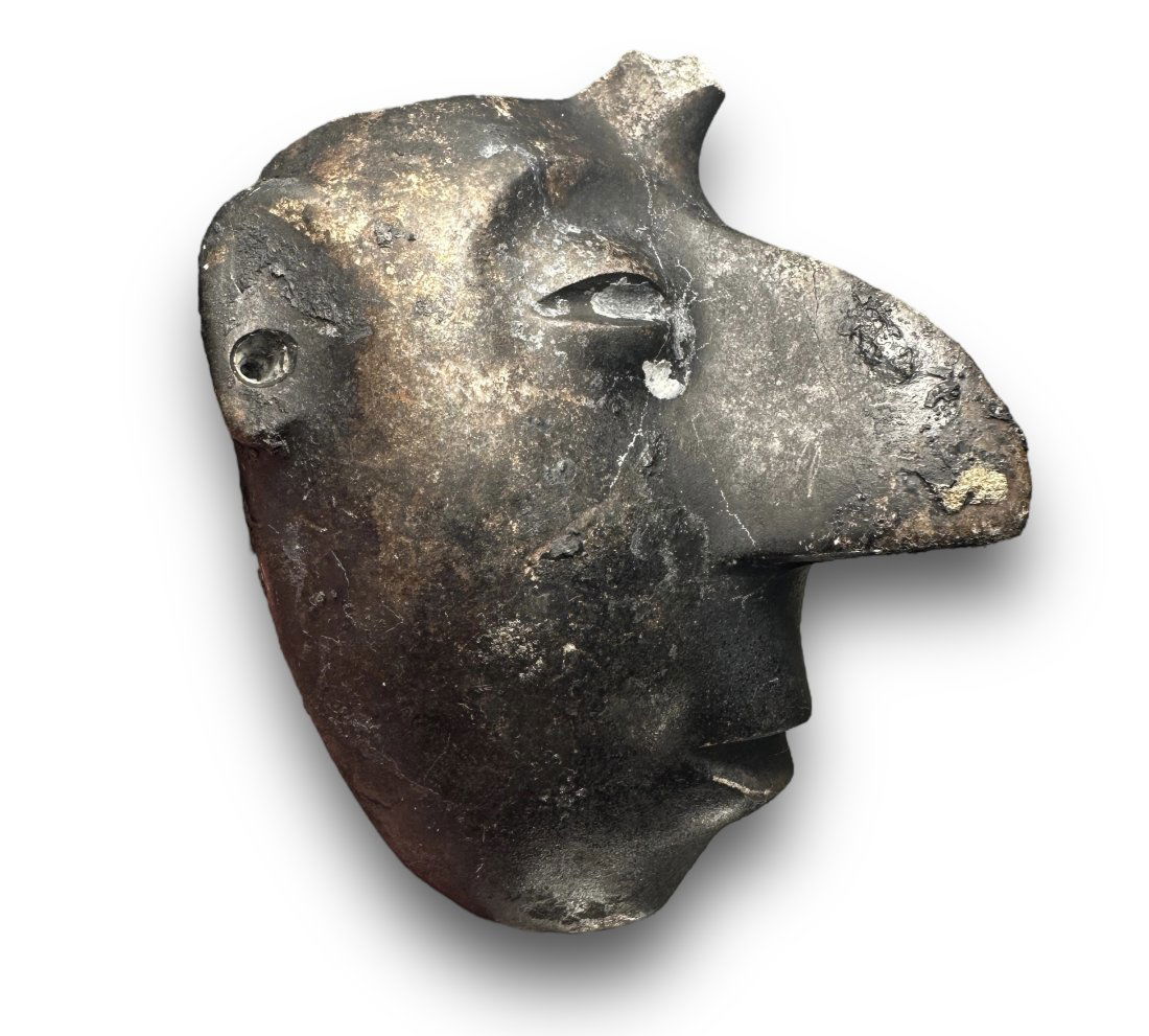 Pre-columbian Chontal Sultepec mask stone fragment - Ex Museum: Pre-columbian Chontal Sultepec mask stone fragment from Guerrero, Mexico, ca. 400-100 BCE. Carved mask with exaggerated nose. 4-1/2" height. This mask came from the collection of the Wolfs museum that