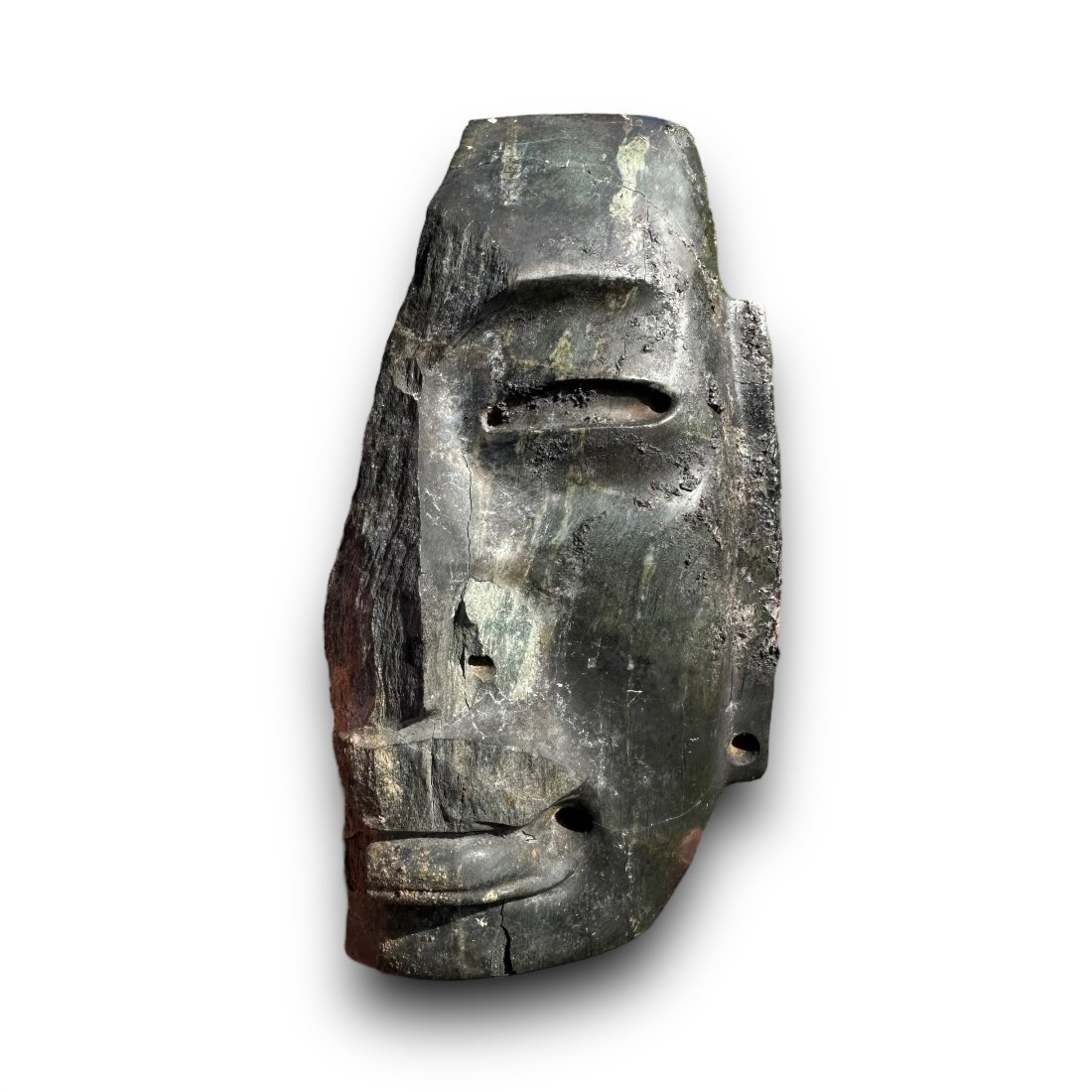 Pre-Columbian Teotihuacan green stone fragment - Ex. Museum: Pre-Columbian Teotihuacan green stone fragment from Mexico, ca. 600-800 CE. This mask came from the collection of the Wolfs museum that burned down in Florida in 2019. The mask was caught in the fire 