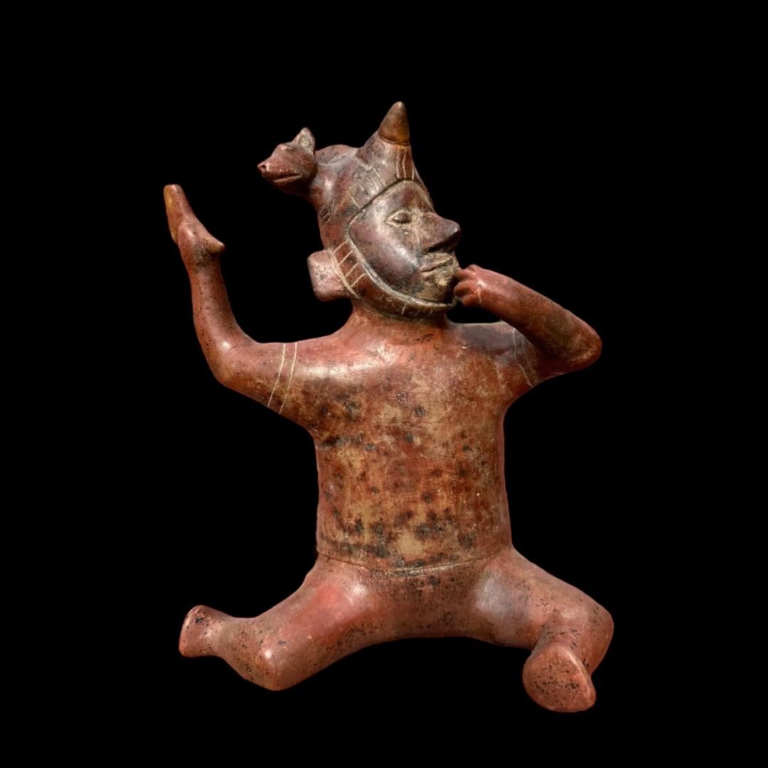 Pre-Columbian Colima seated pottery figure (1 of 5)