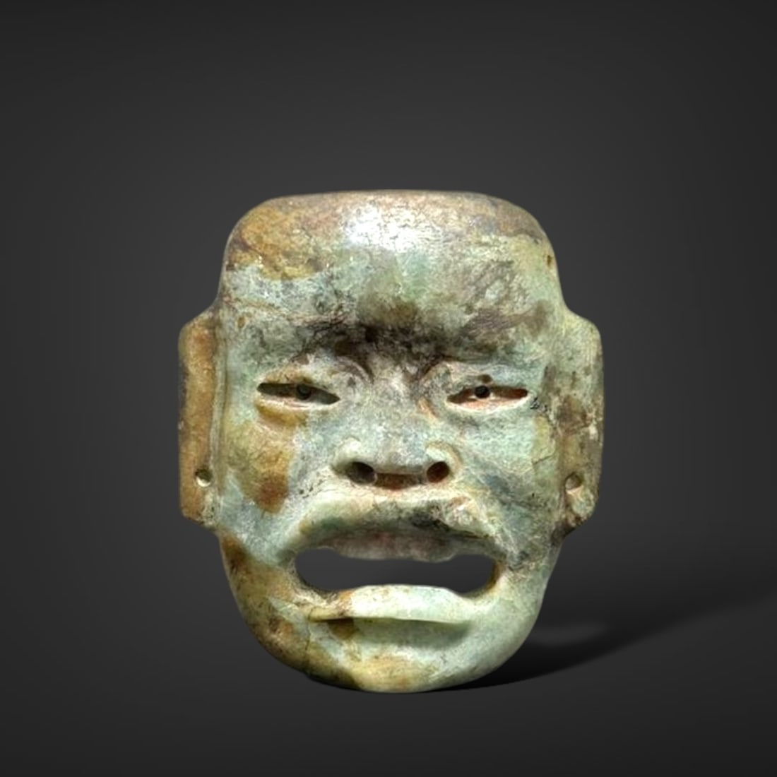 Pre-Columbian Olmec jade face pendant (1 of 4)