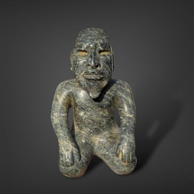 Pre-Columbian Olmec stone kneeling figure