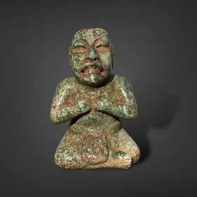 Pre-Columbian Olmec green stone seated figure