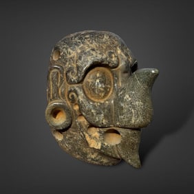 Pre-Columbian Maya stone god mask