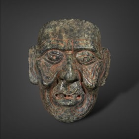 Pre-Columbian Maya god green stone mask