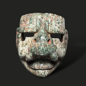Pre-Columbian Olmec green stone jaguar mask
