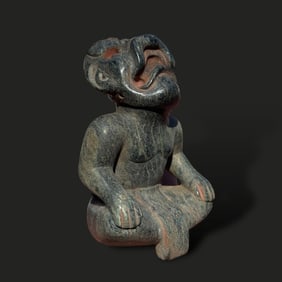Pre-Columbian Olmec serpentine transformation figure