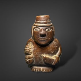 Pre-Columbian Huari stone figure with trophy head