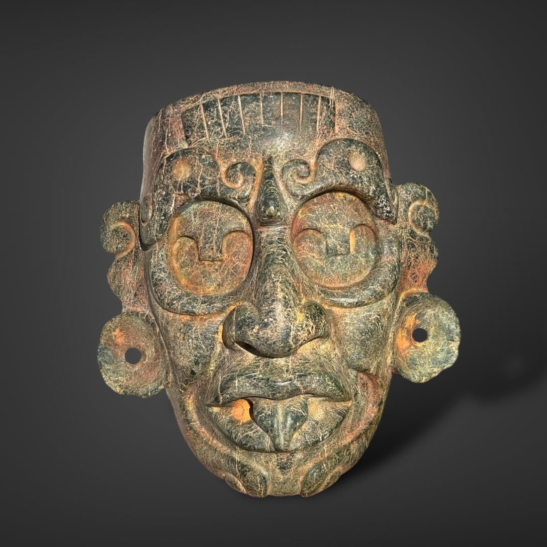 Pre-Colombian Maya god green stone mask (1 of 3)
