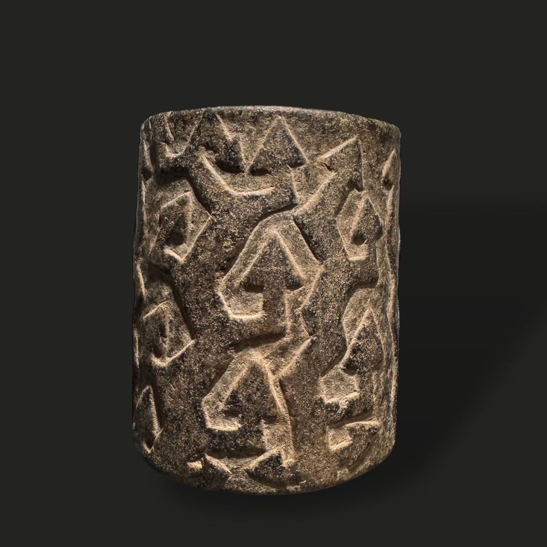 Pre-Columbian Condorhuasi stone carved kero: Pre-Columbian Condorhuasi stone kero from Alamito, Argentina, dating to approximately 400–700 CE. The mortar is cylindrical with a slightly rounded base and features intricate carved patterns on its