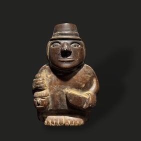 Pre-Columbian Huari stone figure with trophy head