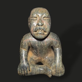 Pre-Columbian Olmec green stone seated figure
