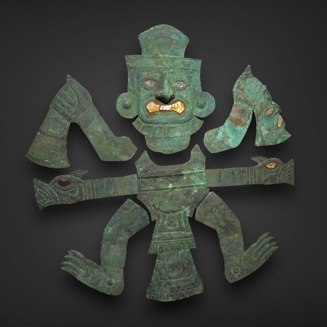 Pre-Columbian Moche copper decapitator figure: North Coast of Peru, circa 100 BC-500 CE. Moche Copper Decapitator with Inlay of Shell and Spondylus is a ceremonial artifact from the Moche culture. This piece represents a highly detailed figure, of